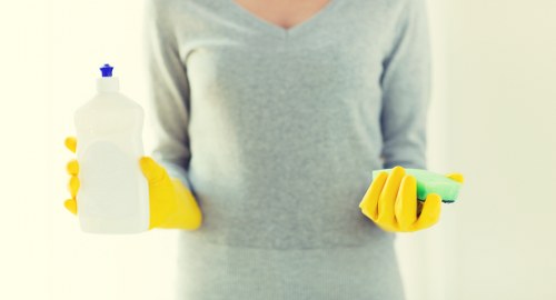 Protected carpet cleaning setup with PPE and safety measures